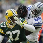 Dallas Cowboys wide receiver Dez Bryant (88) catches a pass against Green Bay Packers cornerback Sam Shields (37) during the second half of an NFL divisional playoff football game Sunday, Jan. 11, 2015, in Green Bay, Wis. The play was reversed after a challenge by Green Bay. (AP Photo/Nam Y. Huh)