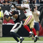 San Francisco 49ers cornerback Perrish Cox (20) breaks up a pass intended for Arizona Cardinals wide receiver Michael Floyd (15) during the second half of an NFL football game, Sunday, Sept. 21, 2014, in Glendale, Ariz. (AP Photo/Ross D. Franklin)