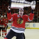Chicago Blackhawks' Teuvo Teravainen, of Finland, hoists the Stanley Cup after defeating the Tampa Bay Lightning in Game 6 of the NHL hockey Stanley Cup Final series on Wednesday, June 10, 2015, in Chicago. The Blackhawks defeated the Lightning 2-0 to win the series 4-2. (AP Photo/Nam Y. Huh)
