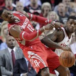 Houston Rockets center Dwight Howard, left, and Portland Trail Blazers forward Dorell Wright collide during the first half of Game 3 of an NBA basketball first-round playoff series in Portland, Ore., Friday, April 25, 2014. (AP Photo/Don Ryan)