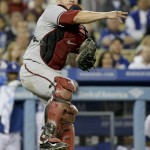  Arizona Diamondbacks catcher Miguel Montero throws Los Angeles Dodgers' Hanley Ramirez out at first during eighth inning of a baseball game in Los Angeles, Friday, April 18, 2014. (AP Photo/Chris Carlson)