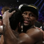 Floyd Mayweather Jr., right, hugs Manny Pacquiao, from the Philippines, after their welterweight title fight on Saturday, May 2, 2015 in Las Vegas. (AP Photo/Isaac Brekken)