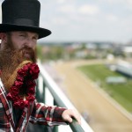 Garey Faulkner watches from a balcony before the 141st running of the Kentucky Derby horse race at Churchill Downs Saturday, May 2, 2015, in Louisville, Ky. (AP Photo/Charlie Riedel)