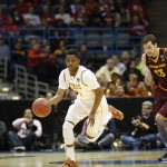 Texas competes against Arizona State during the first half of a second-round game in the NCAA college basketball tournament Thursday, March 20, 2014, in Milwaukee. (AP Photo/Jeffrey Phelps)