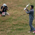 Rory McIlroy of Northern Ireland is photographed as he holds the Claret Jug trophy after winning the British Open Golf championship at the Royal Liverpool golf club, Hoylake, England, Sunday July 20, 2014. (AP Photo/Jon Super)
