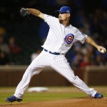  Chicago Cubs starting pitcher Travis Wood pitches against the Arizona Diamondbacks during the first inning of a baseball game on Monday, April 21, 2014, in Chicago. (AP Photo/Andrew A. Nelles)