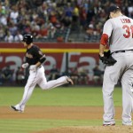 St. Louis Cardinals' Lance Lynn (31) looks down to the ground after giving up a home run to Arizona Diamondbacks' Mark Trumbo, left, during the first inning of a baseball game Saturday, Sept. 27, 2014, in Phoenix. (AP Photo/Ross D. Franklin)