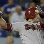  Arizona Diamondbacks' Miguel Montero watches his home run against the Los Angeles Dodgers during sixth inning of a baseball game in Los Angeles, Friday, April 18, 2014. (AP Photo/Chris Carlson)
