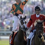 Kerwin D. Clark reacts after riding Lovely Maria to victory in the 141st running of the Kentucky Oaks horse race at Churchill Downs Friday, May 1, 2015, in Louisville, Ky. (AP Photo/Matt Slocum)