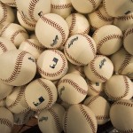 New baseballs wait to be used for batting practice before the Tampa Bay Rays play the Baltimore Orioles in an opening day baseball game, Monday, April 6, 2015, in St. Petersburg, Fla. (AP Photo/Steve Nesius)