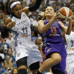 Phoenix Mercury forward Penny Taylor (13) tries to push up to the basket against Minnesota Lynx forward Maya Moore (23) during the first half of Game 2 of the WNBA basketball Western Conference finals, Sunday, Aug. 31, 2014, in Minneapolis. (AP Photo/Stacy Bengs)