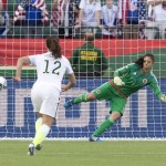 United States' Lauren Holiday (12) watches the ball go wide as Colombia's goalkeeper Stefany Castano (1) tries to make the save during second half FIFA Women's World Cup round of 16 soccer action in Edmonton, Alberta, Canada, Monday, June 22, 2015. (Jason Franson/The Canadian Press via AP)
