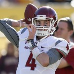 Washington State's Luke Falk throws a pass a he warms up prior to an NCAA college football game against Arizona State Saturday, Nov. 22, 2014, in Tempe, Ariz. (AP Photo/Ross D. Franklin)