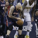 Atlanta Hawks' Pero Antic (6) is fouled by Indiana Pacers' Lance Stephenson (1) during the first half in Game 2 of an opening-round NBA basketball playoff series Tuesday, April 22, 2014, in Indianapolis. (AP Photo/Darron Cummings)