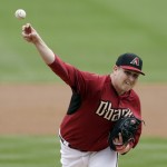 Arizona Diamondbacks starting pitcher Trevor Cahill pitches to an Oakland Athletics batter during the first inning of an exhibition spring training baseball game Thursday, March 6, 2014, in Scottsdale, Ariz. (AP Photo/Gregory Bull)