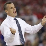 Florida head coach Billy Donovan redacts during the second half of an NCAA Final Four tournament college basketball semifinal game against Connecticut Saturday, April 5, 2014, in Arlington, Texas. (AP Photo/David J. Phillip)