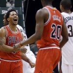 Chicago Bulls' Derrick Rose reacts after scoring during the second overtime of Game 3 of an NBA basketball first-round playoff series against the Milwaukee Bucks on Thursday, April 23, 2015, in Milwaukee. The Bulls won 113-106 to take a 3-0 lead in the series. (AP Photo/Morry Gash)