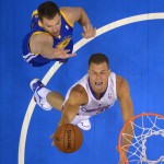 Los Angeles Clippers forward Blake Griffin, below, puts up a shot as Golden State Warriors forward David Lee defends during the first half in Game 1 of an opening-round NBA basketball playoff series, Saturday, April 19, 2014, in Los Angeles. (AP Photo/Mark J. Terrill)
