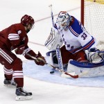 New York Rangers goalie Cam Talbot (33) makes the save on Arizona Coyotes center Tobias Rieder during a penalty shot during the third period of an NHL hockey game, Saturday, Feb. 14, 2015, in Glendale, Ariz. The Rangers won 5-1. (AP Photo/Rick Scuteri)