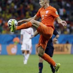 
Netherlands' Arjen Robben leaps to stop a pass during the World Cup quarterfinal soccer match between the Netherlands and Costa Rica at the Arena Fonte Nova in Salvador, Brazil, Saturday, July 5, 2014. (AP Photo/Natacha Pisarenko)