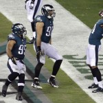  Philadelphia Eagles' Bradley Fletcher (24) celebrates with Connor Barwin (98) and Mychal Kendricks (95) after returning an interception for a touchdown during the first half of an NFL football game against the Carolina Panthers, Monday, Nov. 10, 2014, in Philadelphia. (AP Photo/Matt Rourke)