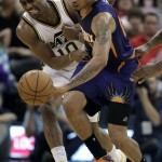 Phoenix Suns' Gerald Green, right, steals the ball from Utah Jazz' Alec Burks during the first half of an NBA basketball game in Salt Lake City, Saturday, Nov. 1, 2014. (AP Photo/George Frey)