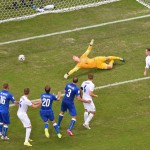  England's goalkeeper Joe Hart fails to make a save as Italy's Claudio Marchisio scores his side's first goal during the group D World Cup soccer match between England and Italy at the Arena da Amazonia in Manaus, Brazil, Saturday, June 14, 2014. (AP Photo/Francois Xavier Marit, pool)