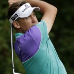 Ian Poulter, of England, watches his tee shot on the 11th hole during the second round of the PGA Championship golf tournament at Valhalla Golf Club on Friday, Aug. 8, 2014, in Louisville, Ky. (AP Photo/David J. Phillip)
