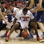 Arizona's Rondae Hollis-Jefferson (23) grabs for the ball in the second half of an NCAA college basketball game in the quarterfinals of the Pac-12 conference tournament Thursday, March 12, 2015, in Las Vegas. Arizona won 73-51. (AP Photo/John Locher)