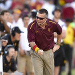 Arizona State head coach Todd Graham, center, reacts during the first half of an NCAA college football game against Southern California, Saturday, Oct. 4, 2014, in Los Angeles. (AP Photo/Gus Ruelas)
