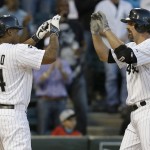  Chicago White Sox's Paul Konerko, right, celebrates with teammate Dayan Viciedo after hitting a two-run home run against the Arizona Diamondbacks during the fifth inning of an interleague baseball game in Chicago, Saturday, May 10, 2014. (AP Photo/Nam Y. Huh)