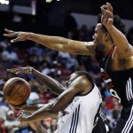 Chicago Bulls' Darrell Williams, right, guards Phoenix Suns' Jerel McNeal during the first half of an NBA summer league basketball game Saturday, July 18, 2015, in Las Vegas. (AP Photo/John Locher)
