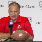 Arizona head coach Rich Rodriguez takes questions at the 2014 Pac-12 NCAA college football media days at Paramount Studios in Los Angeles Wednesday, July 23, 2014. (AP Photo)