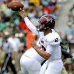 Troy quarterback Brandon Silvers (12) releases a pass during the first half an NCAA college football against UAB in Birmingham, Ala., Saturday, Aug. 30, 2014. (AP Photo/The (Troy) Messenger, Thomas Graning)