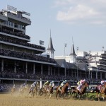 Horses make their way around turn one during the 141st running of the Kentucky Derby horse race at Churchill Downs Saturday, May 2, 2015, in Louisville, Ky. (AP Photo/Darron Cummings)