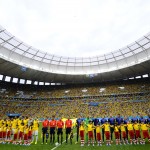 The teams line up before the World Cup third-place soccer match between Brazil and the Netherlands at the Estadio Nacional in Brasilia, Brazil, Saturday, July 12, 2014. (AP Photo/Manu Fernandez)