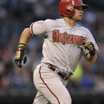  Arizona Diamondbacks' Gerardo Parra watches his two-run home run during the third inning of a baseball game against the Chicago White Sox in Chicago, Friday, May 9, 2014. (AP Photo/Paul Beaty)