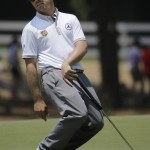 Louis Oosthuizen, of South Africa reacts after missing a putt on the 15th hole during the final round of the U.S. Open golf tournament in Pinehurst, N.C., Sunday, June 15, 2014. (AP Photo/Eric Gay)