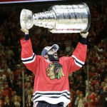 Chicago Blackhawks' Johnny Oduya, of Sweden, celebrates after defeating the Tampa Bay Lightning in Game 6 of the NHL hockey Stanley Cup Final series on Monday, June 15, 2015, in Chicago. The Blackhawks defeated the Lightning 2-0 to win the series 4-2. (AP Photo/Nam Y. Huh)
