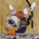 Connecticut forward DeAndre Daniels and Florida guard Scottie Wilbekin watch for a rebound during the first half of the NCAA Final Four tournament college basketball semifinal game Saturday, April 5, 2014, in Arlington, Texas. (AP Photo/David J. Phillip)