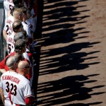 Members of the Arizona Diamondbacks line up for the national anthem before the start of a baseball game against the Colorado Rockies, Saturday, Sept. 20, 2014, in Denver. (AP Photo/Jack Dempsey)
