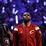 Cleveland Cavaliers forward LeBron James (23) waits during the playing of the national anthem before the start of Game 6 of basketball's NBA Finals against the Golden State Warriors, in Cleveland, Tuesday, June 16, 2015. (AP Photo/Tony Dejak)
