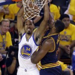 Golden State Warriors guard Shaun Livingston (34) dunks against Cleveland Cavaliers center Tristan Thompson during the first half of Game 5 of basketball's NBA Finals in Oakland, Calif., Sunday, June 14, 2015. (AP Photo/Eric Risberg)
