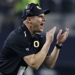 Oregon head coach Mark Helfrich during the first half of the NCAA college football playoff championship game against Ohio State Monday, Jan. 12, 2015, in Arlington, Texas. (AP Photo/Brandon Wade)