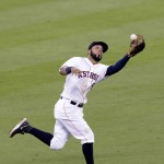  Houston Astros' Marwin Gonzalez makes the catch and the out on Arizona Diamondbacks' Chris Owings on a soft fly ball in the eighth inning of a baseball game Wednesday, June 11, 2014, in Houston. (AP Photo/Pat Sullivan)