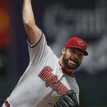 Arizona Diamondbacks starting pitcher Josh Collmenter works against the Colorado Rockies in the first inning of the first game of a baseball doubleheader Wednesday, May 6, 2015, in Denver. (AP Photo/David Zalubowski)