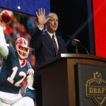 NFL Hall of Famer and Buffalo Bill Quarterback Jim Kelly announces that the Buffalo Bills selects Florida State defensive back Ronald Darby as the 50th pick in the second round of the 2015 NFL Football Draft, Friday, May 1, 2015, in Chicago. (AP Photo/Charles Rex Arbogast)