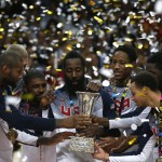 United States players celebrate their victory after winning the final World Basketball match against Serbia at the Palacio de los Deportes stadium in Madrid, Spain, Sunday, Sept. 14, 2014. (AP Photo/Daniel Ochoa de Olza)