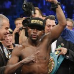 Floyd Mayweather Jr. is named the winner over Manny Pacquiao, from the Philippines, in their welterweight title fight on Saturday, May 2, 2015 in Las Vegas. (AP Photo/John Locher)