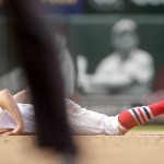 St. Louis Cardinals' Peter Bourjos is slow to get up after he was caught trying to steal second to end the eighth of a baseball game against the Arizona Diamondbacks Monday, May 25, 2015, in St. Louis. (AP Photo/Jeff Roberson)